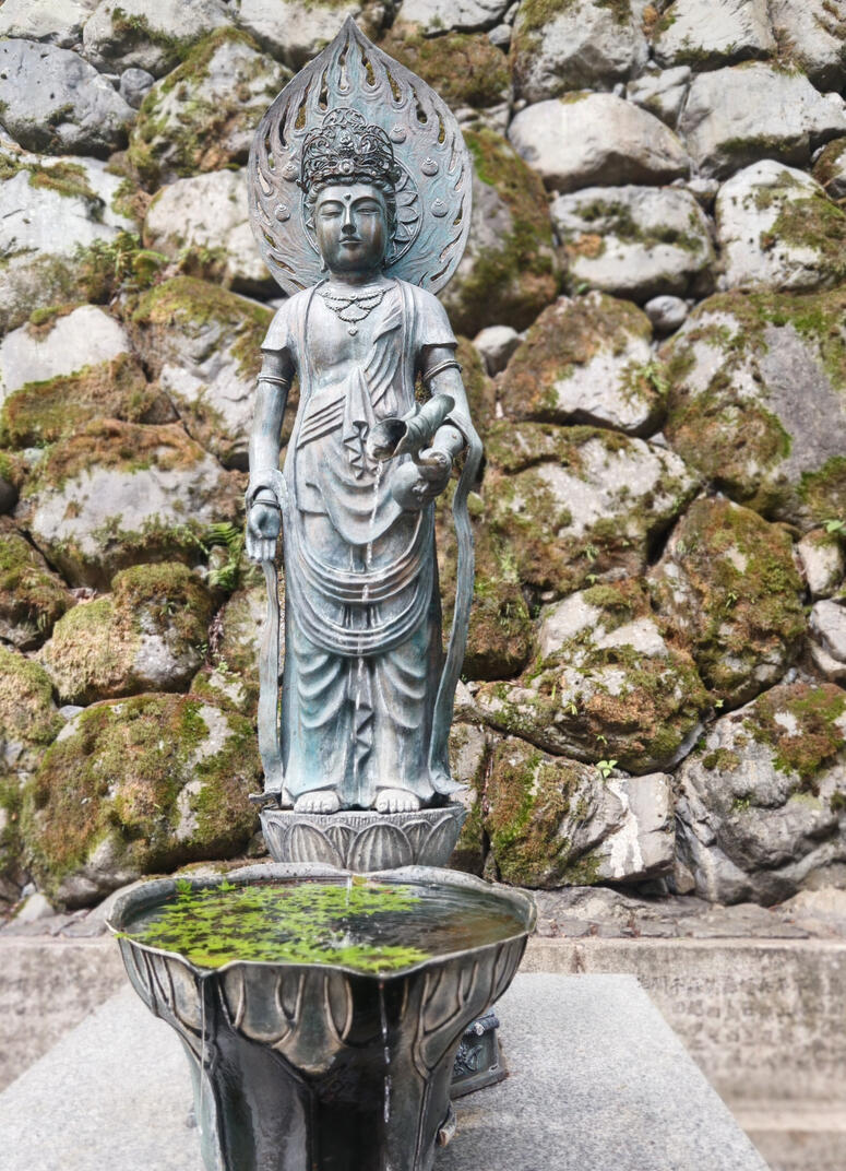 At the entrance of Mount Kurama, this statue of Kannon Bodhisattva welcomes visitors with a gentle presence. A symbol of compassion and purification, she marks the beginning of the spiritual path toward Kurama-dera.